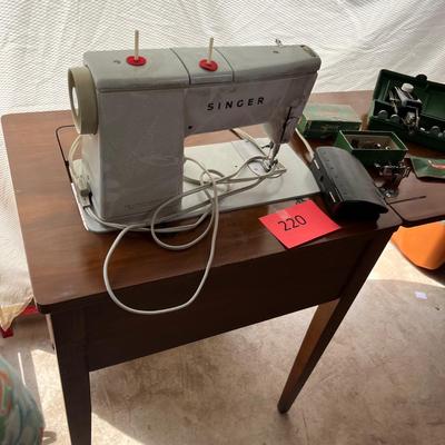 Singer Sewing machine in cabinet