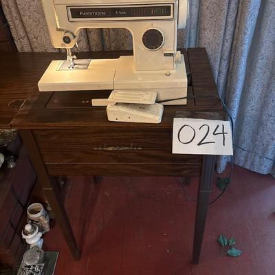 Sewing machine with table