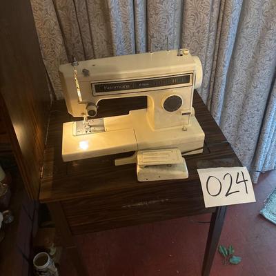 Sewing machine with table