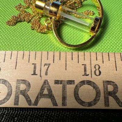 Necklace with vile pendant