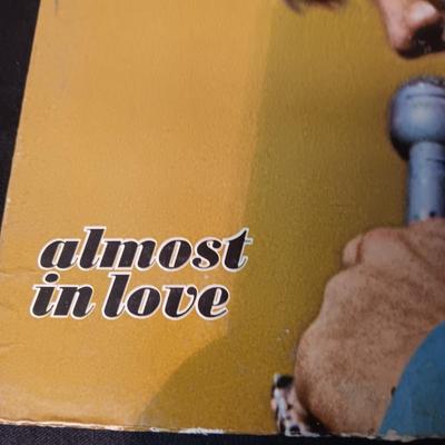 "LOVE LETTERS FROM ELVIS" AND "ALMOST IN LOVE" VINYL RECORDS