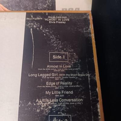 "LOVE LETTERS FROM ELVIS" AND "ALMOST IN LOVE" VINYL RECORDS