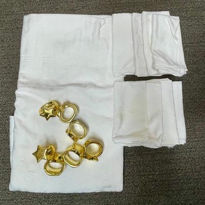 Tablecloth 60" x 96" oblong oval, Square Napkins, and Gold Ceramic Star Napkin Rings