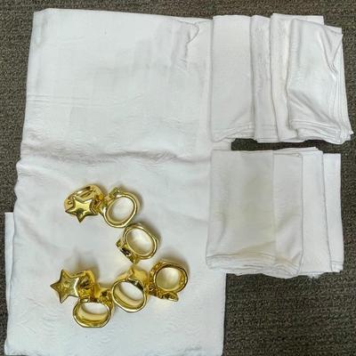 Tablecloth 60" x 96" oblong oval, Square Napkins, and Gold Ceramic Star Napkin Rings