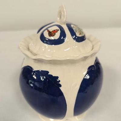 Ceramic Cookie Jar The lid has Butterflies & Bird Designs