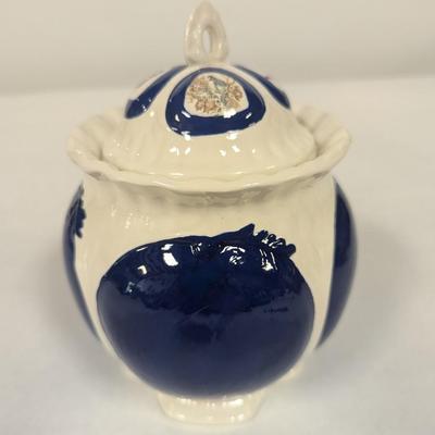 Ceramic Cookie Jar The lid has Butterflies & Bird Designs