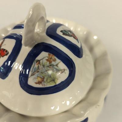Ceramic Cookie Jar The lid has Butterflies & Bird Designs