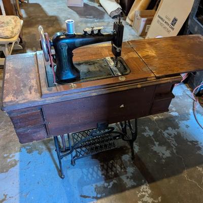 Vintage Sewing Cabinet With Plymouth Machine On Wheels