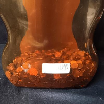 22" TALL PLASTIC ELVIS GUITAR COIN BANK WITH MANY PENNIES INCLUDED