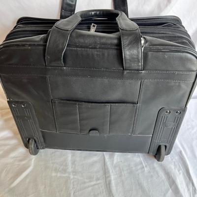 Three Tumi Briefcases (P-MK)
