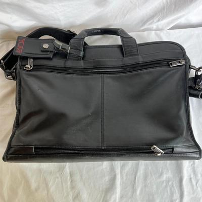 Three Tumi Briefcases (P-MK)