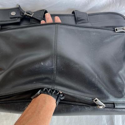 Three Tumi Briefcases (P-MK)
