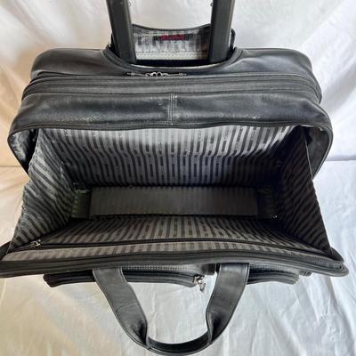 Three Tumi Briefcases (P-MK)