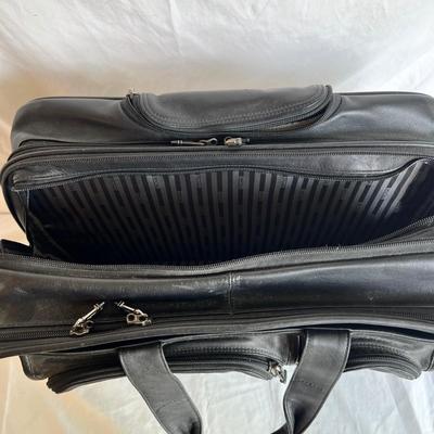 Three Tumi Briefcases (P-MK)