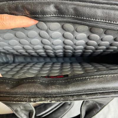 Three Tumi Briefcases (P-MK)