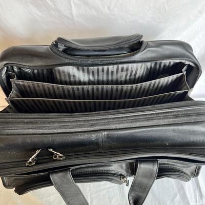 Three Tumi Briefcases (P-MK)