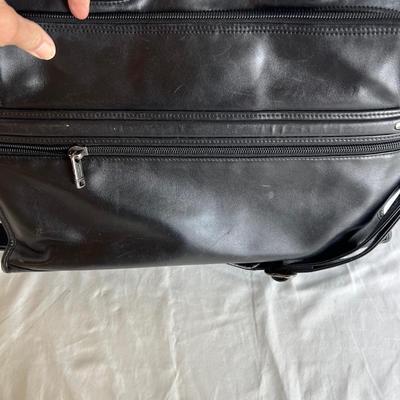 Three Tumi Briefcases (P-MK)