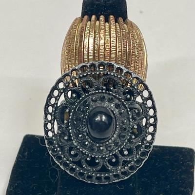 Vintage Rings - Gold tone stretch ring and Black Sundial stretch Ring