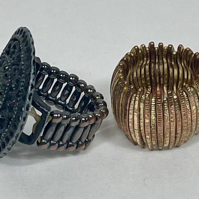 Vintage Rings - Gold tone stretch ring and Black Sundial stretch Ring