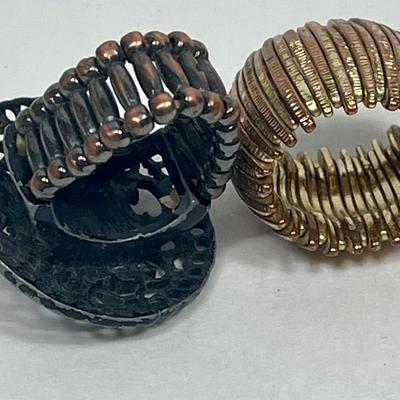 Vintage Rings - Gold tone stretch ring and Black Sundial stretch Ring