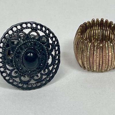 Vintage Rings - Gold tone stretch ring and Black Sundial stretch Ring