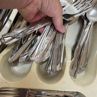 Tray of stainless steel flatware