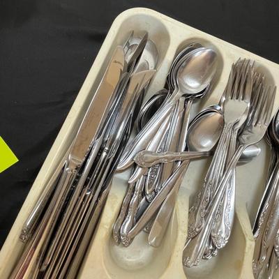 Tray of stainless steel flatware