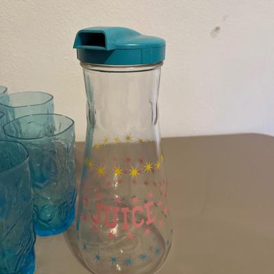 Vintage juice, dispenser, and glasses