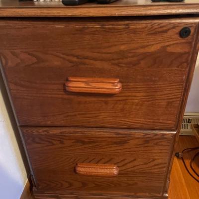 Two drawer wood file cabinet with TV