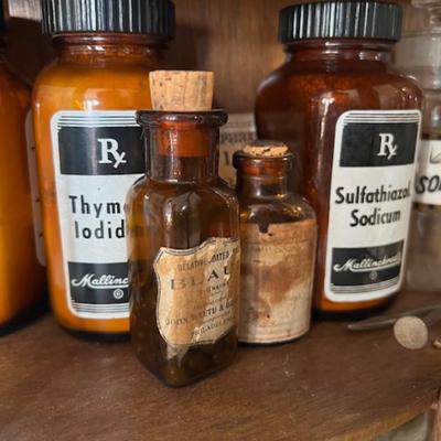 Pair of Display Cabinets with Vintage Medicine Bottles and More