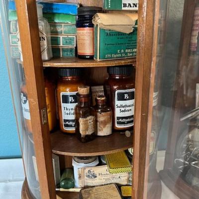 Pair of Display Cabinets with Vintage Medicine Bottles and More