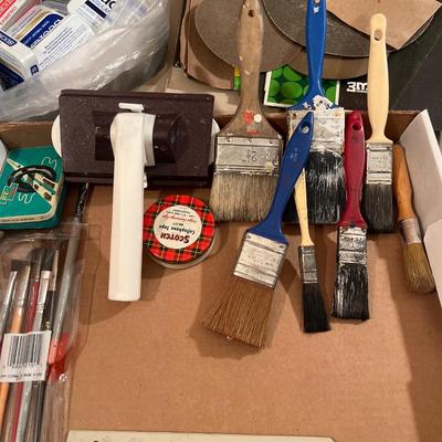 Miscellaneous painting, sanding paper, tin storage