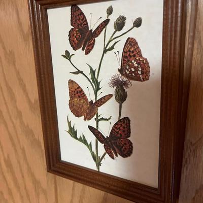 Three pictures on wall