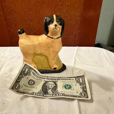 Redware dog figure with polychrome finish