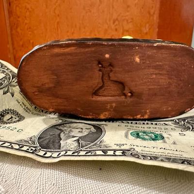 Redware dog figure with polychrome finish