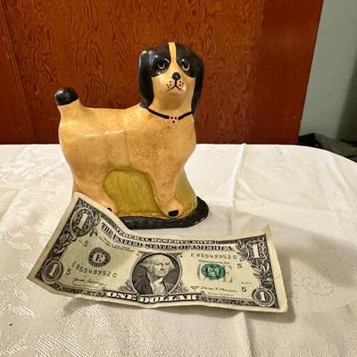 Redware dog figure with polychrome finish