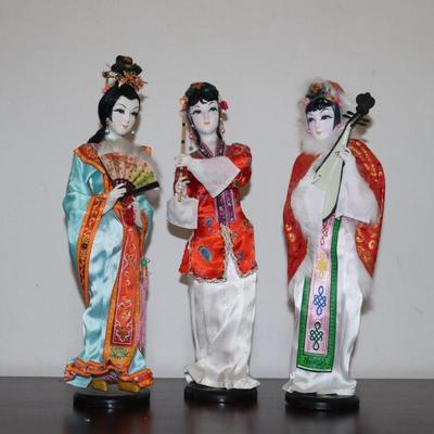 Lot of 3 Vintage Asian Dolls (2) With Silk Clothing On Wood Stands