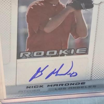 8 signed sport card including Lamar Jackson, Matt Carpenter