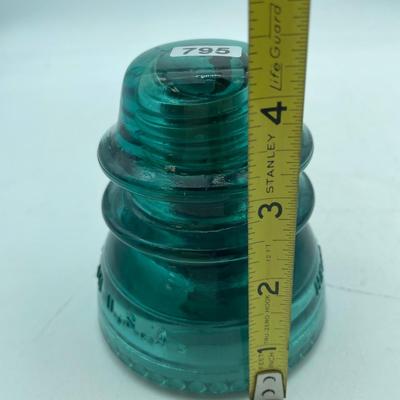 Large teal glass insulator