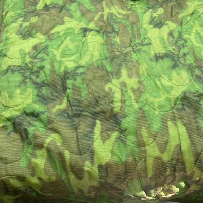 Under poncho liner