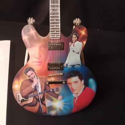 ELVIS COFFEE TABLE BOOK AND A LEGEND IN LIGHTS GUITAR