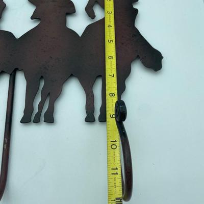 Cowboy hanging rack