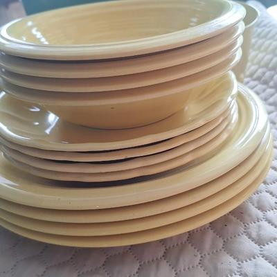 Gibson dishes set service for four yellow