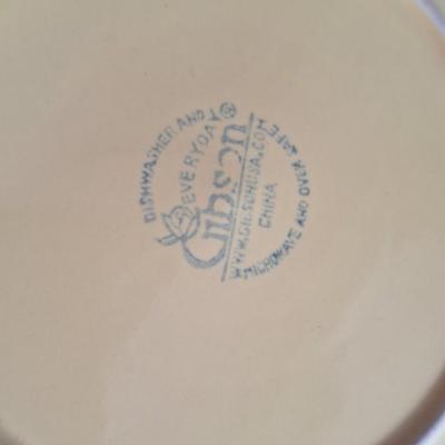 Gibson dishes set service for four yellow