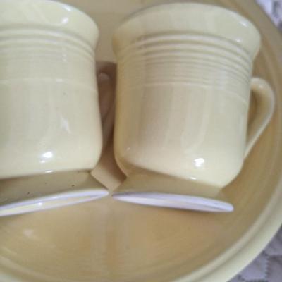 Gibson dishes set service for four yellow