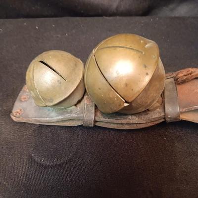 ANTIQUE SLEIGH BELLS ON LEATHER STRAP