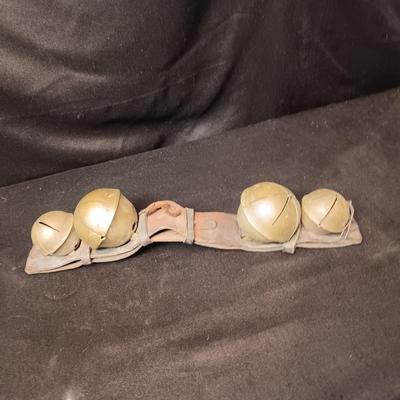 ANTIQUE SLEIGH BELLS ON LEATHER STRAP