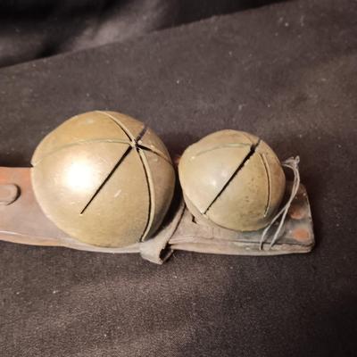 ANTIQUE SLEIGH BELLS ON LEATHER STRAP