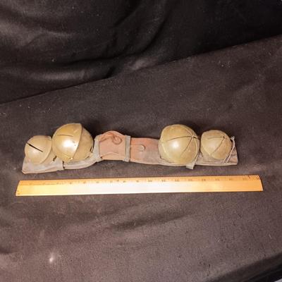 ANTIQUE SLEIGH BELLS ON LEATHER STRAP