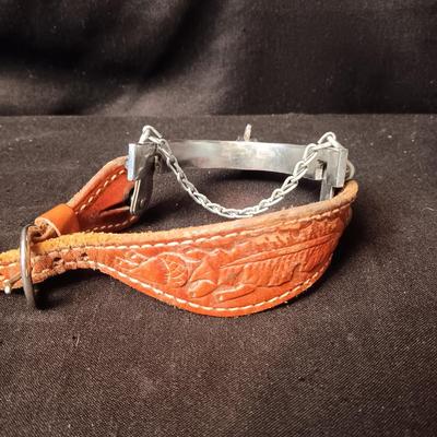 PAIR OF SPURS WITH LEATHER TOOLED STRAP